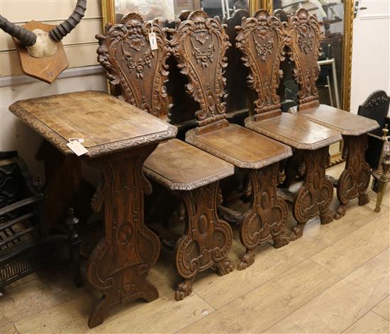 Four oak and walnut Sgabello hall chairs and a similar table, 19th century W.61cm
